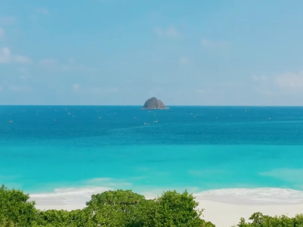 Serangan Beach - blue water and white sands